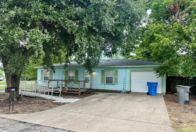 view of front of home with a garage