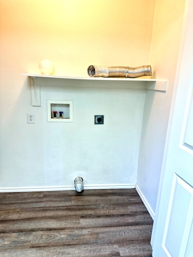 clothes washing area with hookup for a washing machine, hookup for an electric dryer, and dark hardwood / wood-style flooring