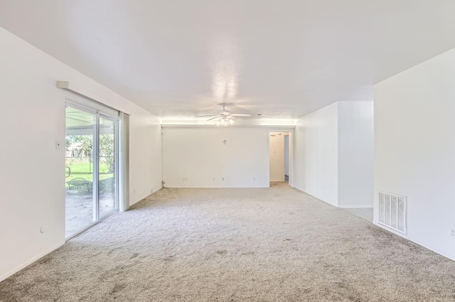 carpeted empty room with ceiling fan