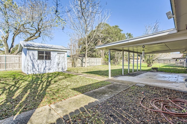 view of yard with a patio area and a shed