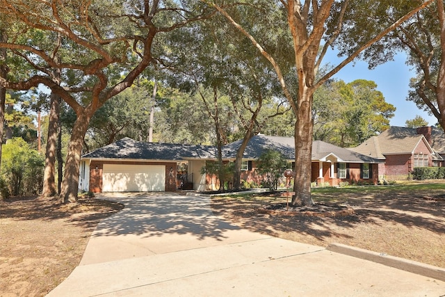 ranch-style house featuring a garage