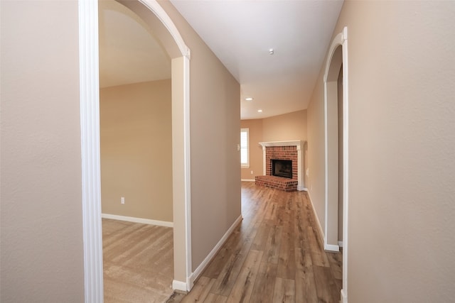 corridor featuring light wood-type flooring