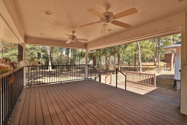 wooden terrace with ceiling fan