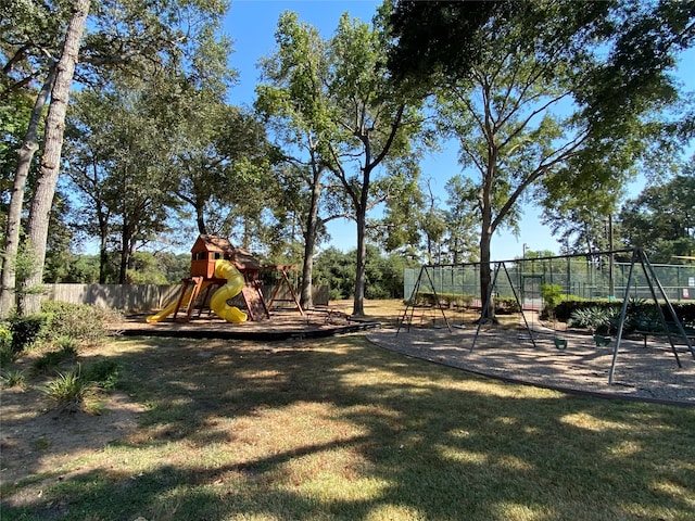 view of playground featuring a lawn