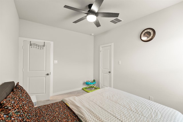 carpeted bedroom featuring ceiling fan