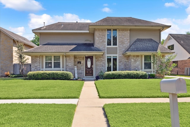 view of front of home with a front lawn