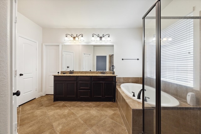 bathroom featuring vanity, separate shower and tub, and tile patterned flooring