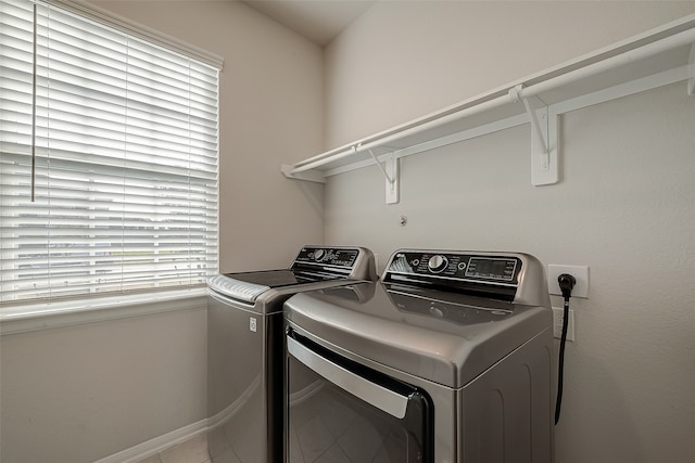 laundry area with washer and clothes dryer