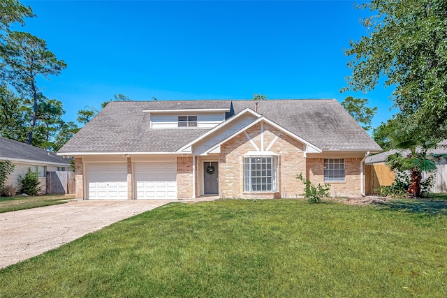 view of front property featuring a front lawn and a garage