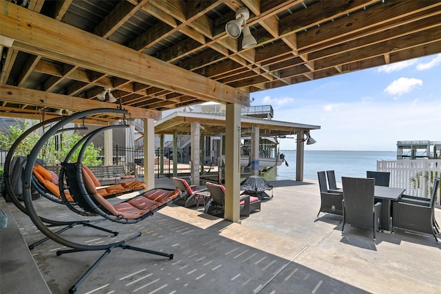 1239 Oahu Dr, Tiki Island, TX 77554 - view of patio featuring a water view