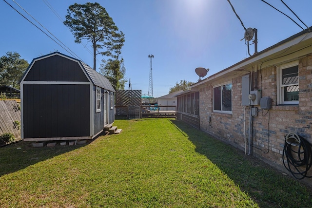 view of yard with a storage shed