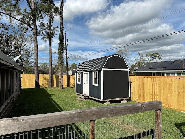 view of yard with a storage unit