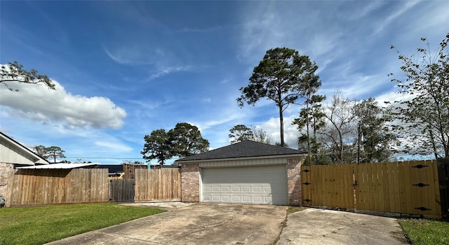 view of side of home with a lawn and a garage