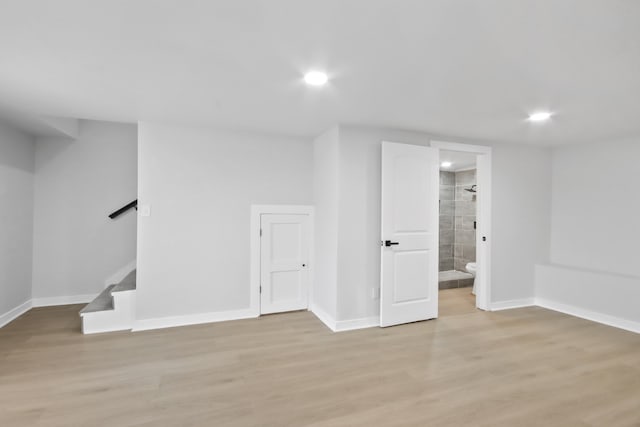 basement featuring light wood-type flooring