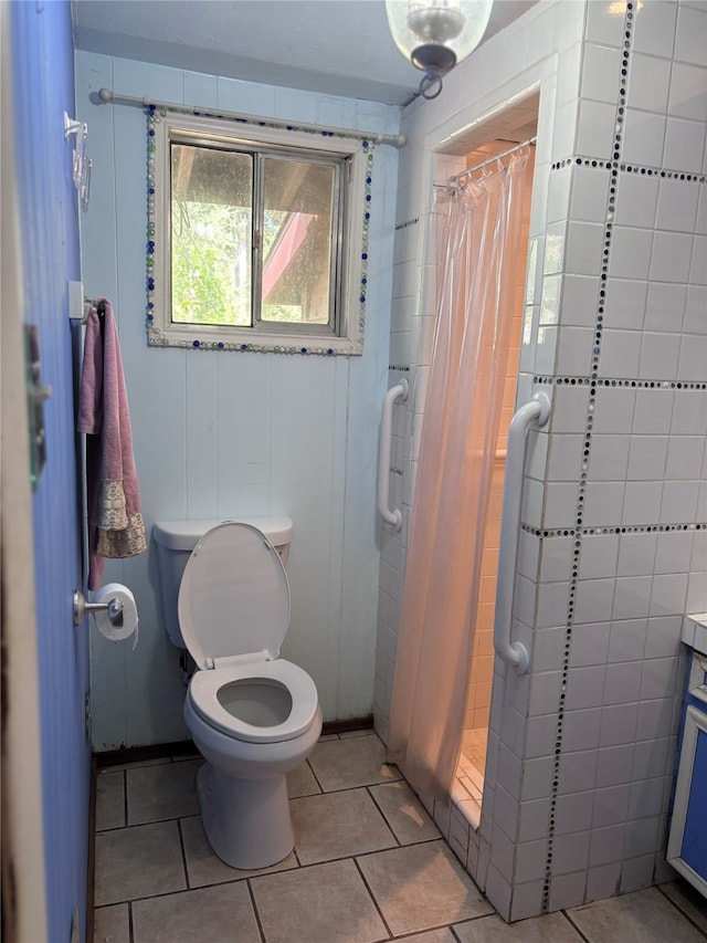 bathroom with vanity, tile patterned flooring, toilet, and a shower with shower curtain