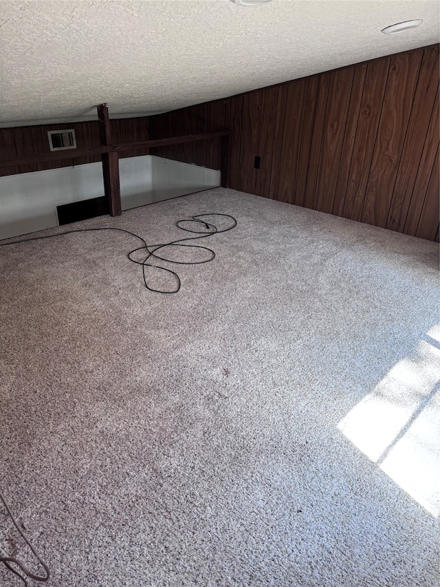 interior space with a textured ceiling