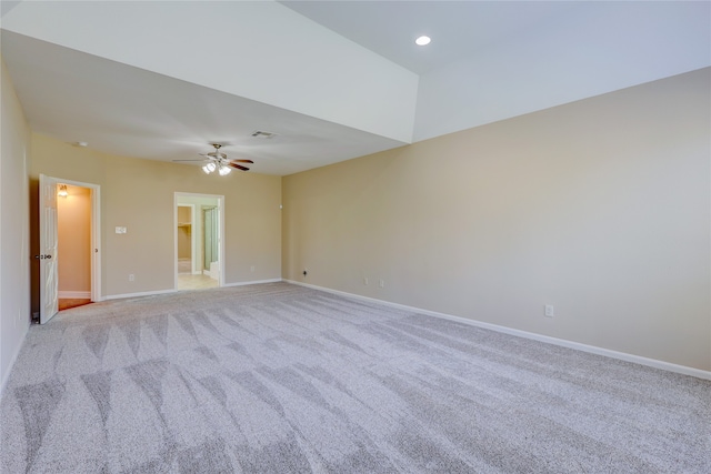 unfurnished room featuring light carpet and ceiling fan