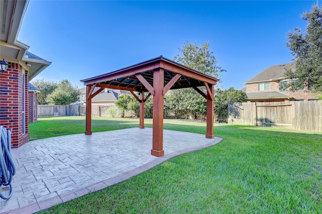 view of yard with a gazebo and a patio