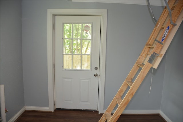 doorway to outside with dark hardwood / wood-style flooring