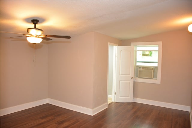 spare room featuring ceiling fan, dark hardwood / wood-style floors, a textured ceiling, and cooling unit