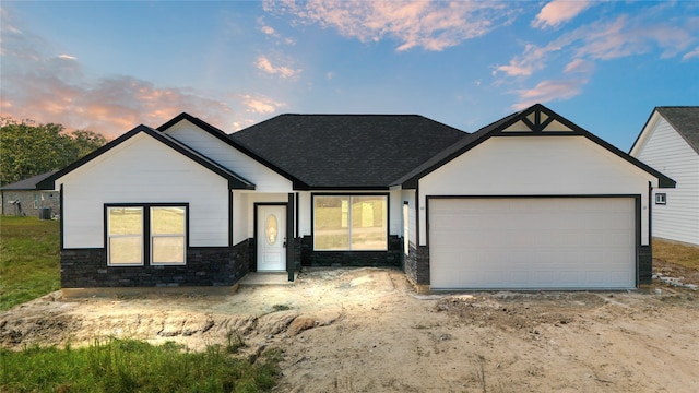 view of front of house with a garage