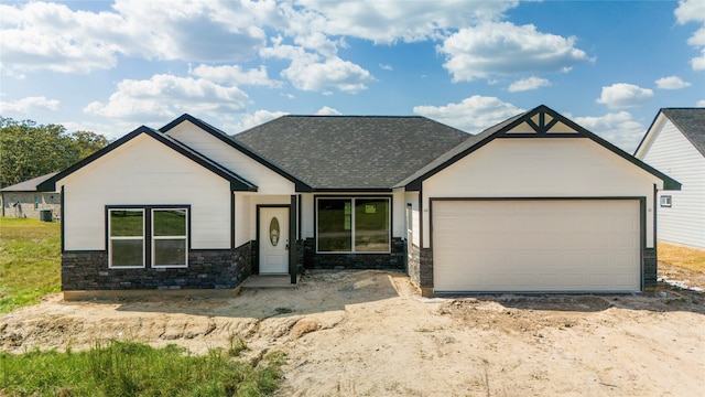 craftsman-style house with a garage