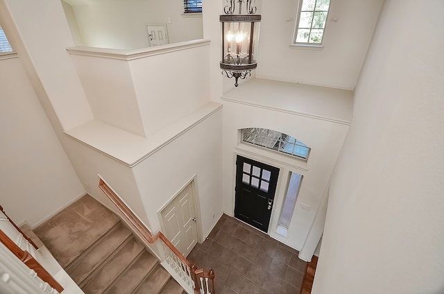 foyer featuring an inviting chandelier