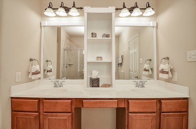 bathroom featuring vanity and a shower with shower door