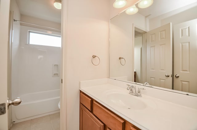 full bathroom with bathtub / shower combination, tile patterned floors, vanity, and toilet