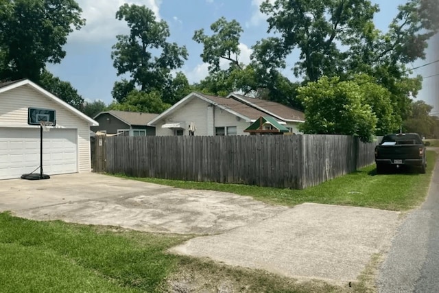 view of yard with a garage