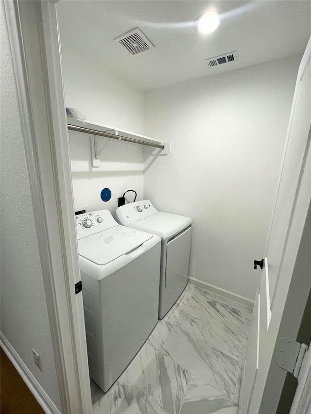 laundry area featuring washer and dryer