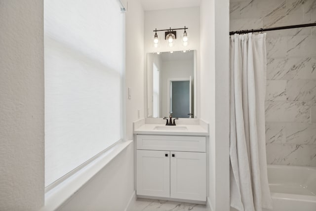 bathroom with vanity and shower / bath combination with curtain