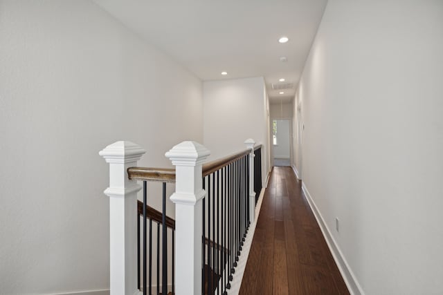 hallway featuring dark hardwood / wood-style flooring