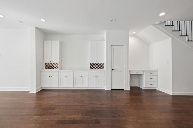 bonus room featuring dark wood-type flooring