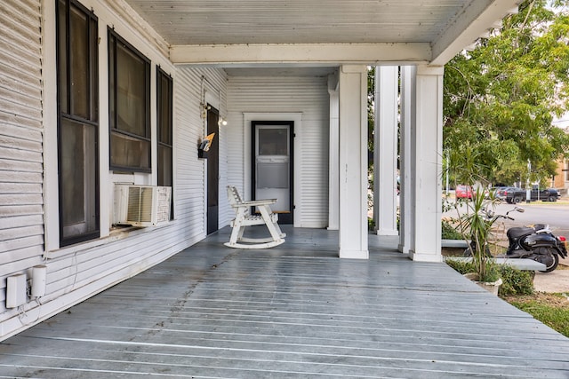 deck with cooling unit and a porch