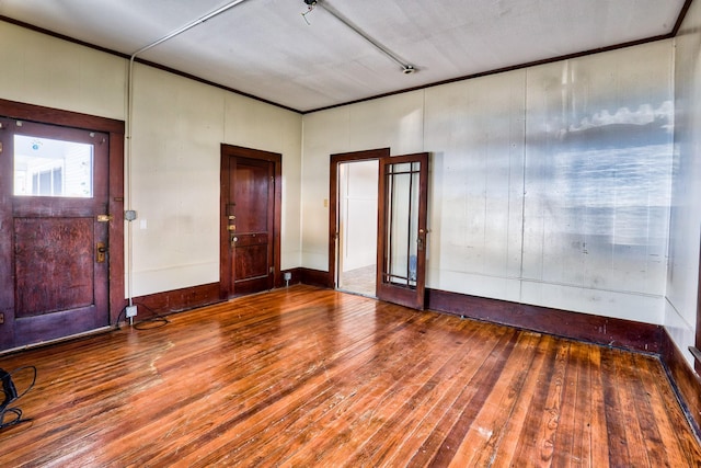 158 E Colorado, La Grange, TX 78945 - foyer featuring hardwood / wood-style floors