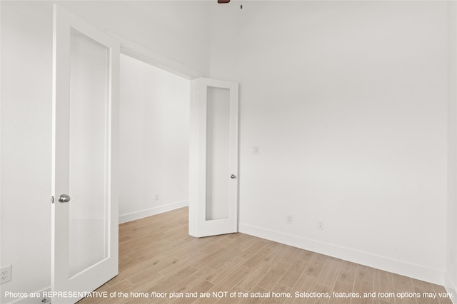 spare room featuring light hardwood / wood-style flooring