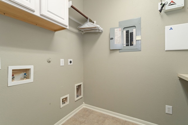 washroom featuring washer hookup, light tile patterned flooring, electric panel, cabinets, and electric dryer hookup