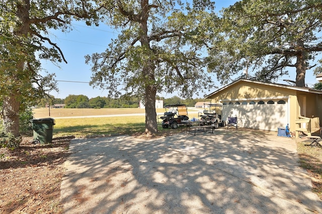 exterior space with an outdoor structure and a garage