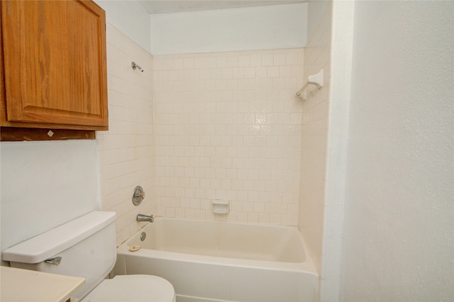 full bathroom featuring vanity, toilet, and tiled shower / bath combo