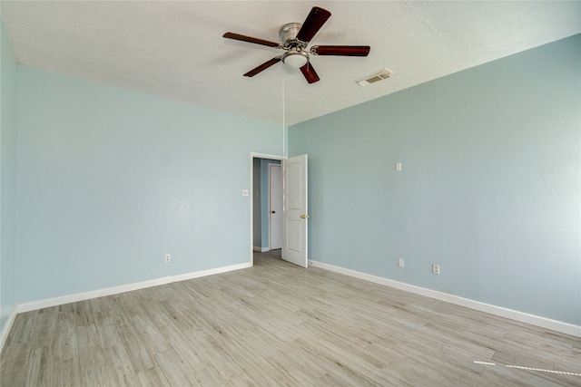 unfurnished room with ceiling fan and light hardwood / wood-style floors