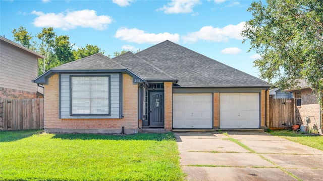 view of front facade featuring a garage and a front yard