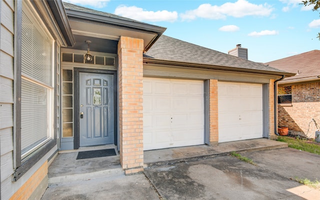 property entrance featuring a garage