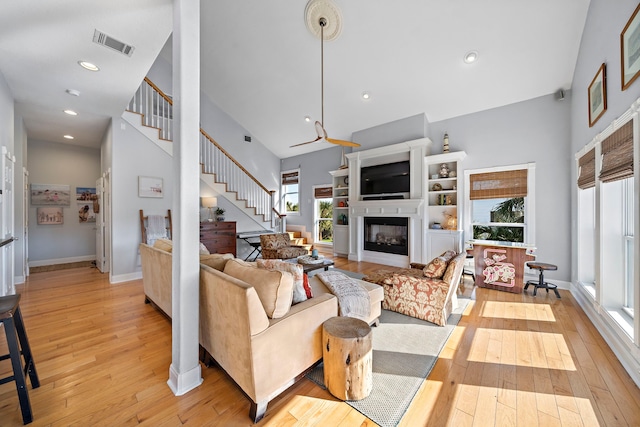 living room with light hardwood / wood-style flooring