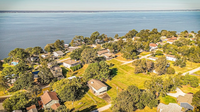 266 Water Ridge Dr, Livingston, TX 77351 - aerial perspective of suburban area featuring a nearby body of water