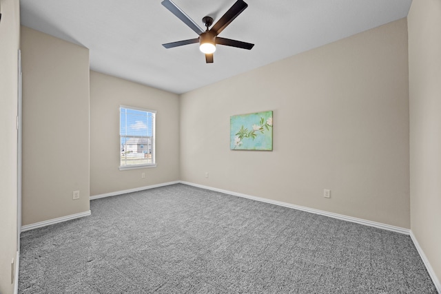 carpeted empty room with ceiling fan