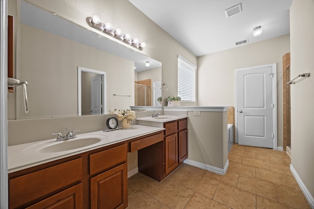 bathroom featuring vanity and an enclosed shower