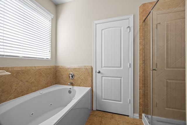 bathroom with plus walk in shower and tile patterned floors