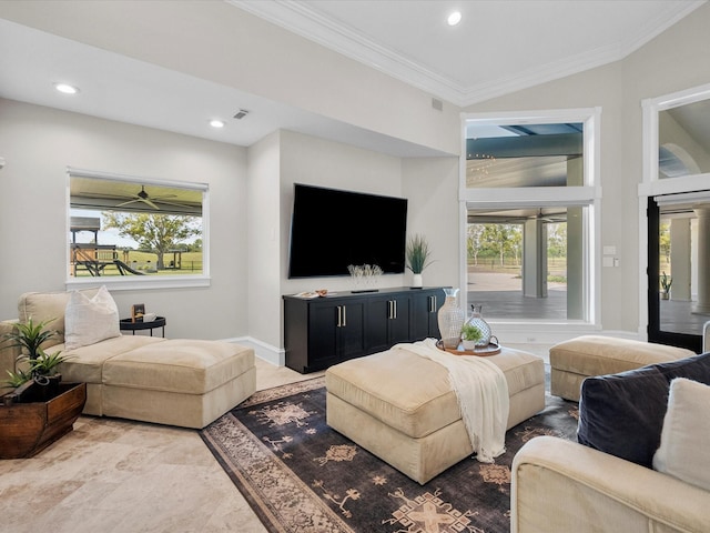 living room with ceiling fan and ornamental molding