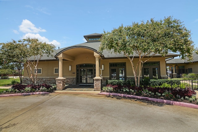 view of front facade featuring french doors